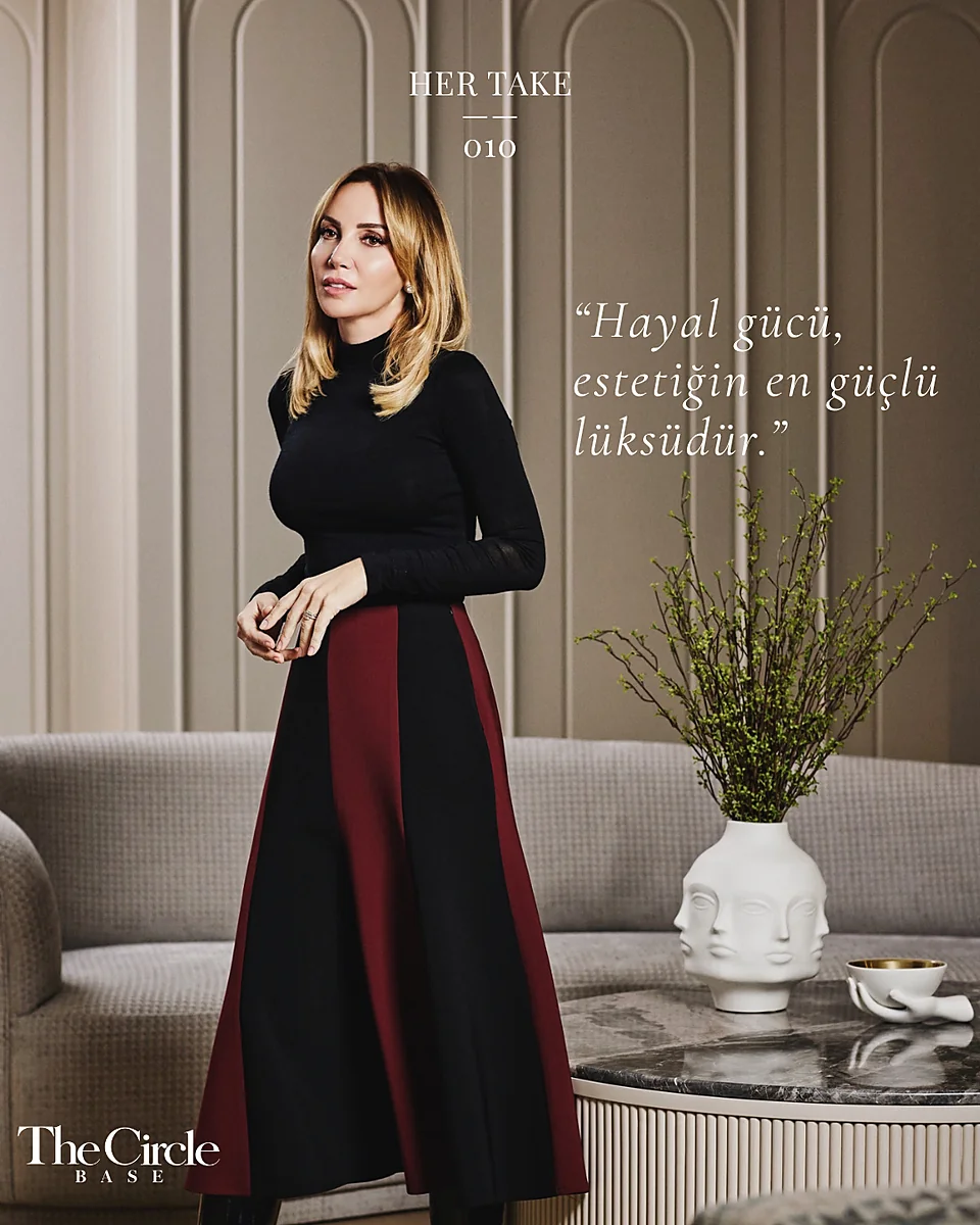 Her Take — portrait in a black turtleneck and burgundy skirt, with a pull quote